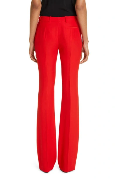 Shop Alexander Mcqueen Leaf Crepe Slim Bootcut Pants In 6085 Red