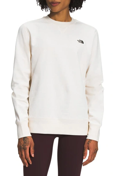 Shop The North Face Heritage Patch Crewneck Sweatshirt In Gardenia White