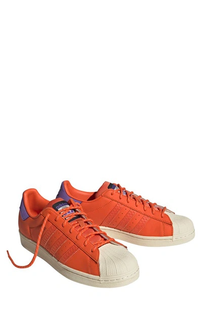 Shop Adidas Originals Superstar Sneaker In Orange/ Orange/ Purple