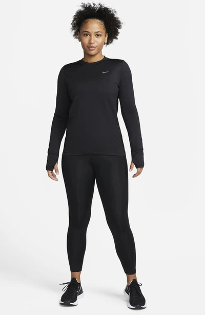 Shop Nike Fast Dri-fit Leggings In Black