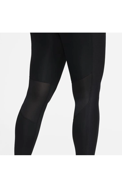 Shop Nike Fast Dri-fit Leggings In Black
