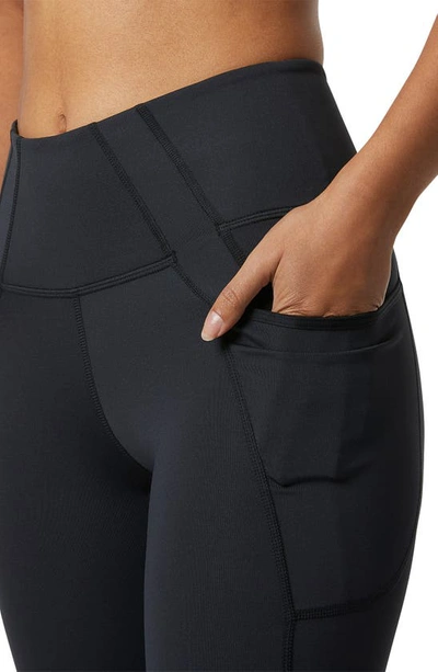 Shop New Balance Shape Shield Pocket 7/8 Crop Leggings In Black