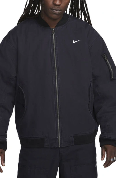 Shop Nike Life Therma-fit Woven Bomber Jacket In Black/ White