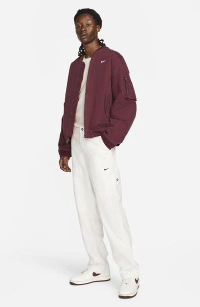 Shop Nike Life Therma-fit Woven Bomber Jacket In Night Maroon/ White