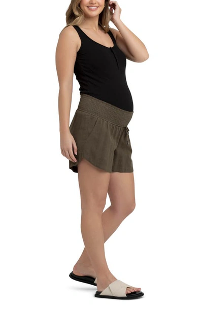 Shop Ripe Maternity Byron Smocked Waist Maternity Shorts In Olive