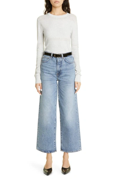 Shop Totême Rigid Organic Cotton Flare Leg Jeans In Worn Blue