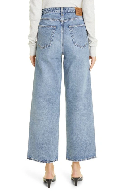 Shop Totême Toteme Rigid Organic Cotton Flare Leg Jeans In Worn Blue