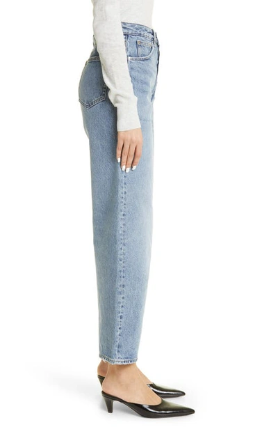 Shop Totême Rigid Organic Cotton Flare Leg Jeans In Worn Blue