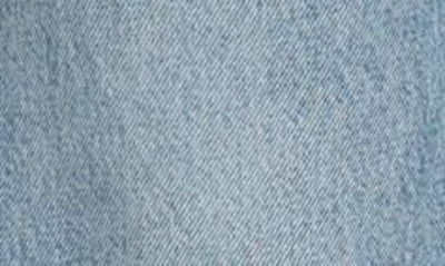 Totême Wide-leg Organic Jeans In Worn Blue