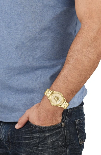 Shop Versace V-code Bracelet Watch, 43mm In Ip Yellow Gold
