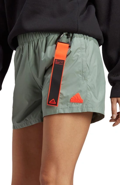 Shop Adidas Sportswear City Escape Recycled Polyester Shorts In Silver Green