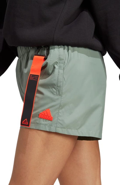 Shop Adidas Sportswear City Escape Recycled Polyester Shorts In Silver Green