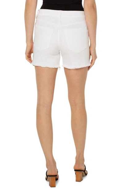Shop Liverpool Los Angeles Gia Glider Pull-on Frayed Denim Shorts In Bright White