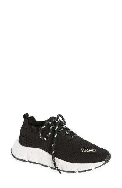 Shop Versace Trigreca Knit Sneaker In Black