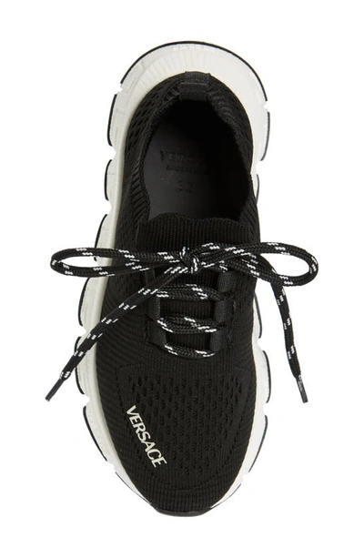 Shop Versace Trigreca Knit Sneaker In Black