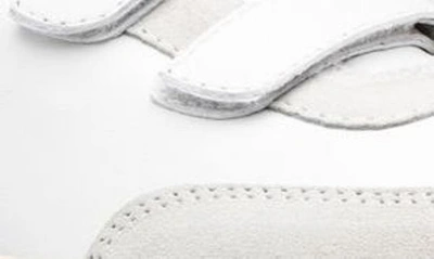 Shop Clae Deane Strap Sneaker In White Leather Black