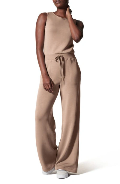 Shop Spanx Airessentials Sleeveless Jumpsuit In Fawn