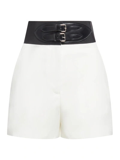 Shop Alaïa Belted Shorts In White