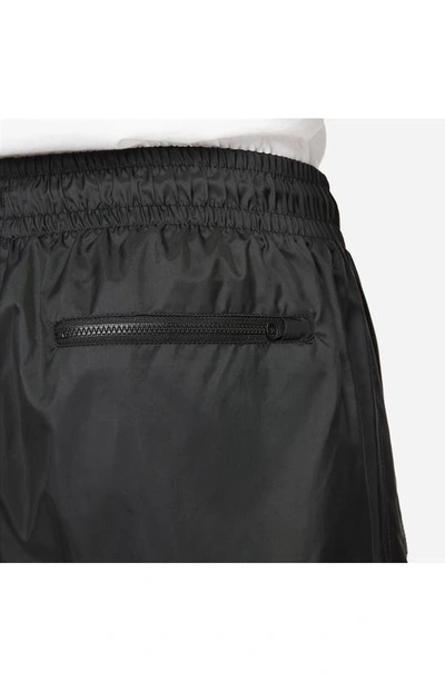 Shop Nike Windrunner Woven Lined Pants In Black/ Black/ White