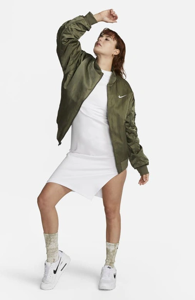 Shop Nike Sportswear Reversible Varsity Quilted Bomber Jacket In Medium Olive/ Orange/ White