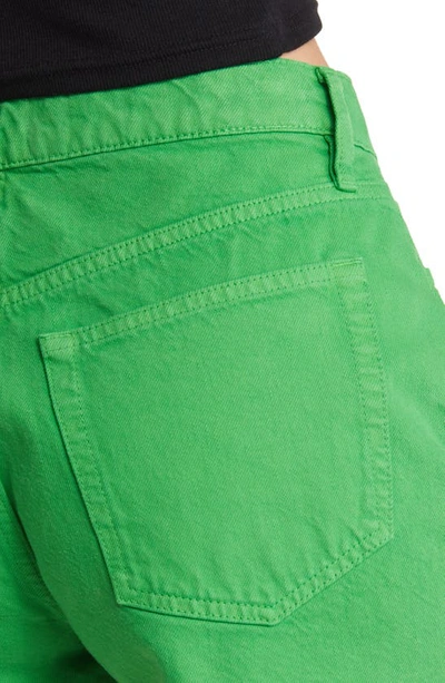 Shop Frame Le Brigette High Waist Raw Edge Denim Shorts In Peridot