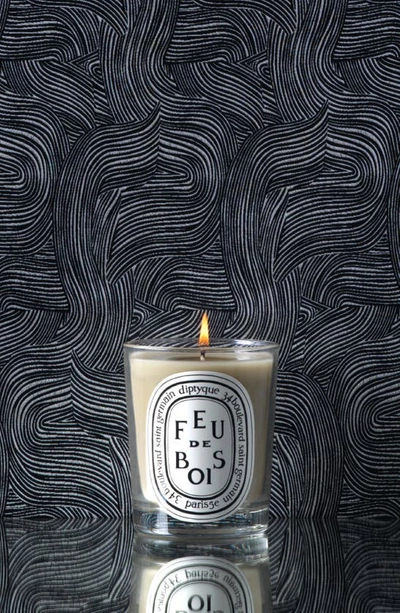 Shop Diptyque Feu De Bois (fire Wood) Scented Candle, 2.4 oz In Clear Vessel
