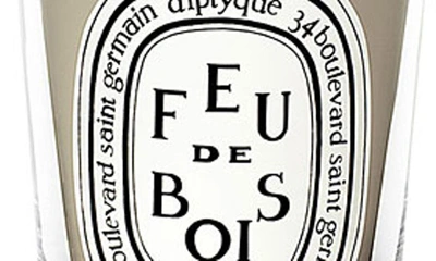 Shop Diptyque Feu De Bois (fire Wood) Scented Candle, 2.4 oz In Clear Vessel