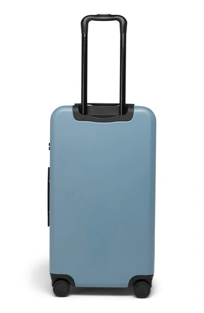 Shop Herschel Supply Co . Heritage™ Hardshell Medium Luggage In Bluestone