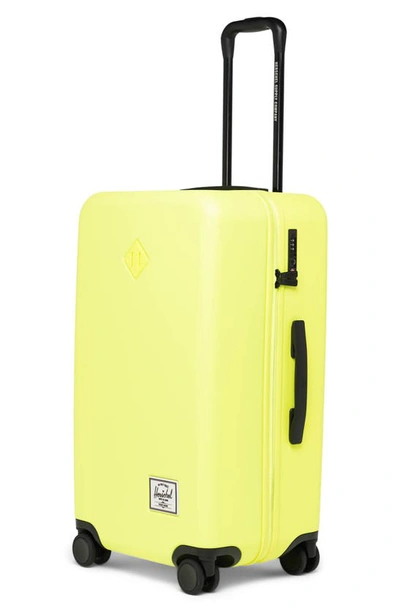 Shop Herschel Supply Co Heritage™ Hardshell Medium Luggage In Safety Yellow