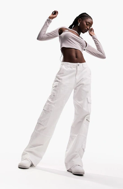 Shop Asos Design Ultimate Cargo Jeans In White