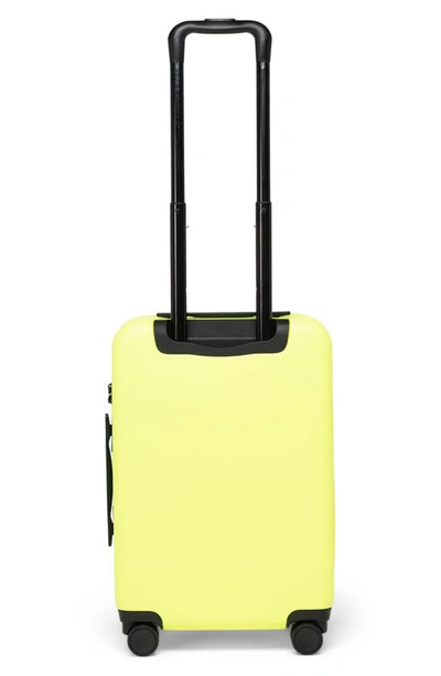 Shop Herschel Supply Co . Heritage™ Hardshell Large Carry-on Luggage In Safety Yellow