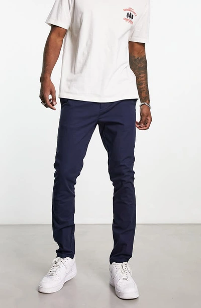 Shop Asos Design Skinny Stretch Twill Chino Pants In Navy