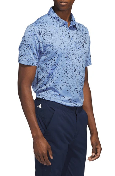 Shop Adidas Golf Spatter Jacquard Performance Golf Polo In Blue Fusion/ Navy/ Blue