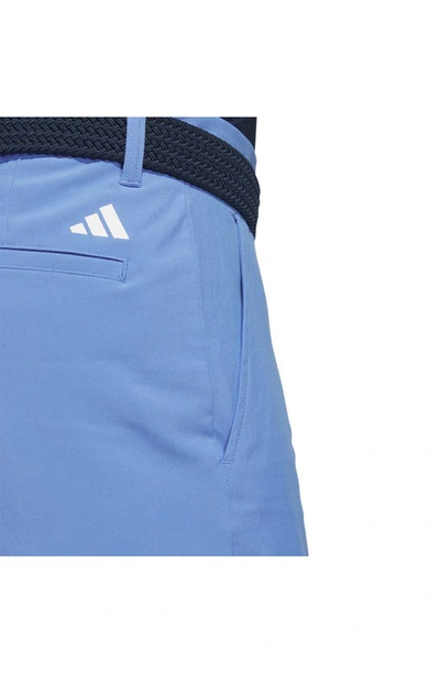 Shop Adidas Golf Ultimate Water Repellent Stretch Flat Front Shorts In Blue Fusion