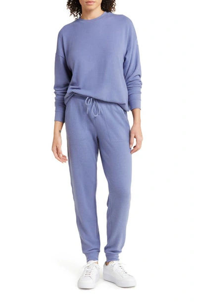 Shop Alo Yoga Soho Sweatpants In Infinity Blue