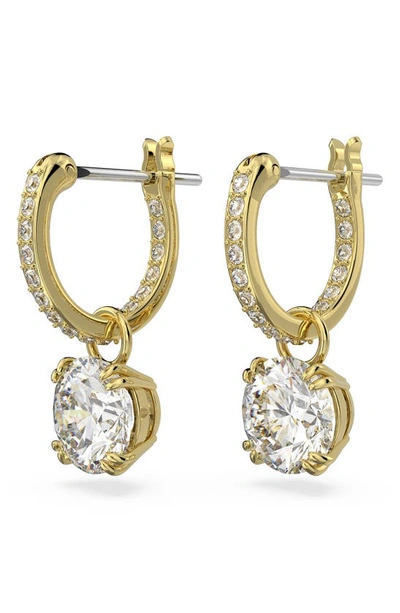 Shop Swarovski Constella Huggie Hoop Earrings In Yellow