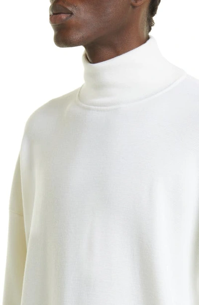 Shop Fear Of God Eternal Lightweight Merino Wool Mock Neck Sweater In Cream