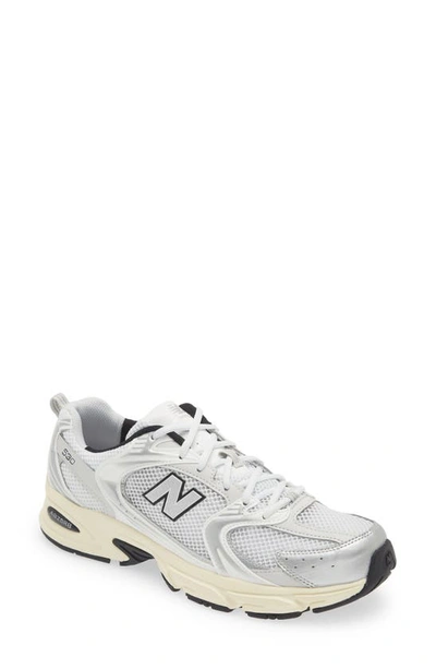 Shop New Balance Gender Inclusive 530 Sneaker In White/ Silver Metallic