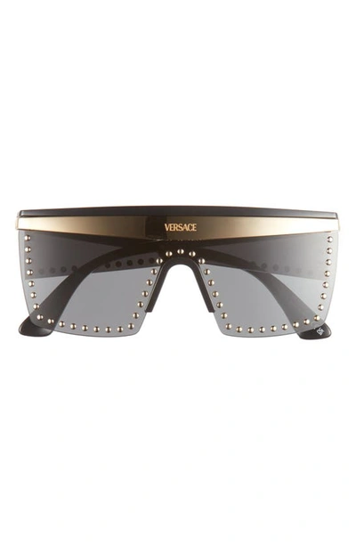 Shop Versace 44mm Shield Sunglasses In Transparent Grey