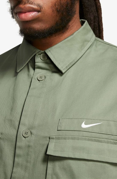 Shop Nike Woven Military Short-sleeve Button-down Shirt In Oil Green/ White