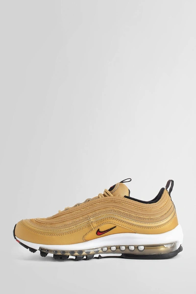 Shop Nike Man Gold Sneakers