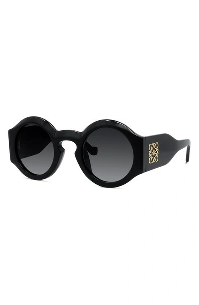 Shop Loewe Chunky Anagram 49mm Small Round Sunglasses In Shiny Black / Gradient Smoke