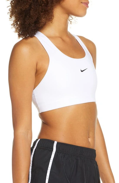 Shop Nike Swoosh Dri-fit Racerback Sports Bra In White/ Black