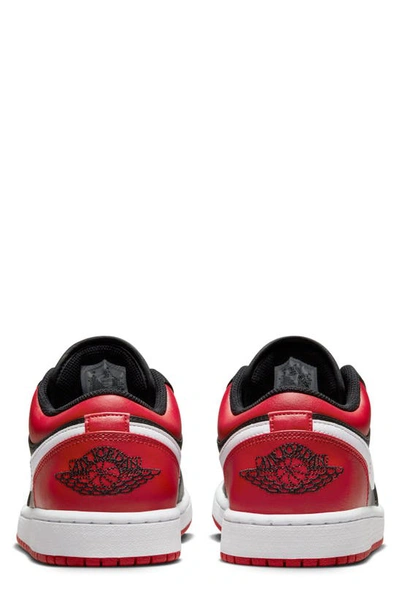 Shop Jordan Air  1 Low Sneaker In Black/ Gym Red/ White