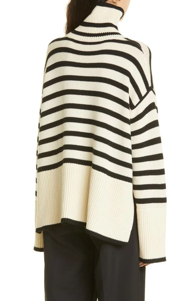 Shop Totême Toteme Stripe Wool Blend Turtleneck Sweater In Light Sand Stripe