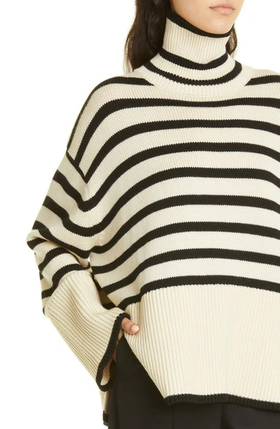 Shop Totême Toteme Stripe Wool Blend Turtleneck Sweater In Light Sand Stripe