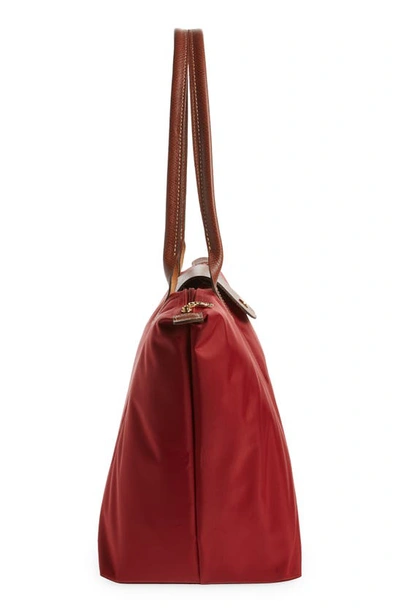 Shop Longchamp Large Le Pliage Tote In Deep Red