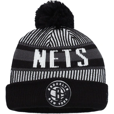 Shop New Era Youth   Black Brooklyn Nets Stripe Cuffed Knit Hat With Pom