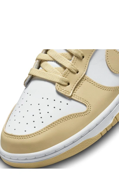 Shop Nike Dunk Low Retro Sneaker In White/ Team Gold/ Wolf Grey