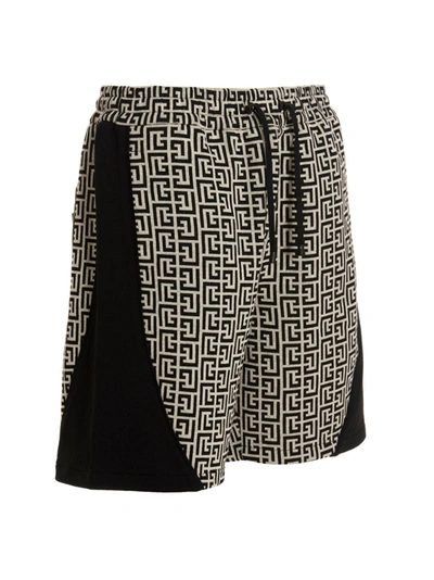 Shop Balmain 'monogram' Bermuda Shorts In White/black